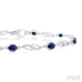 4X3 MM Oval Cut Sapphire and 1/5 Ctw Round Cut Diamond Precious Eternity Link Tennis Bracelet in 10K White Gold