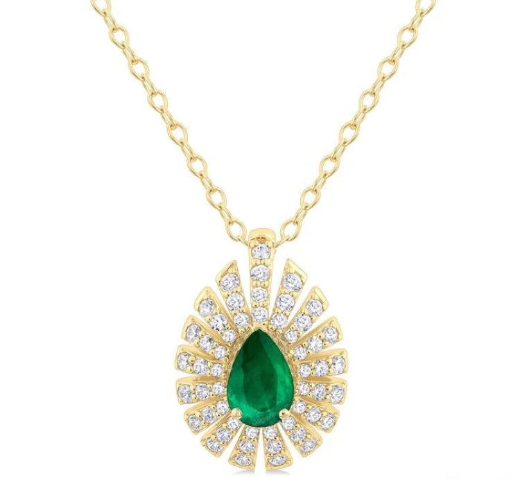 1/3 Ctw Starburst 6X4MM Pear Cut Emerald and Round Cut Diamond Precious Pendant With Chain in 14K Yellow Gold