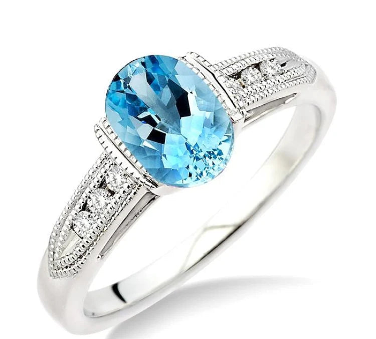 8x6 MM Oval Shape Aquamarine and 1/10 Ctw Diamond Ring in 14K White Gold