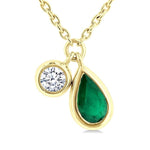 Load image into Gallery viewer, 5x3 MM Pear Cut Emerald and 1/50 Ctw Bezel Set Round Cut Diamond Precious Pendant With Chain in 10K Yellow Gold