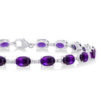 Load image into Gallery viewer, 6X4 MM Oval Cut Amethyst and 1/6 Ctw Round Cut Diamond Semi-Precious Tennis Bracelet in 10K White Gold