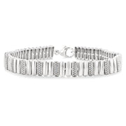 1/6 Ctw Wide Ribbed Plain Polished and Round Cut Diamond Bold Bracelet in Sterling Silver