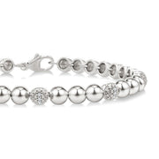 5 MM Bold Bead and 1/6 Ctw Round Cut Diamond Fashion Bracelet in Sterling Silver