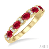 1/6 ctw Oval Shape 4x3MM Ruby and Round Cut Diamond Precious Band in 14K Yellow Gold